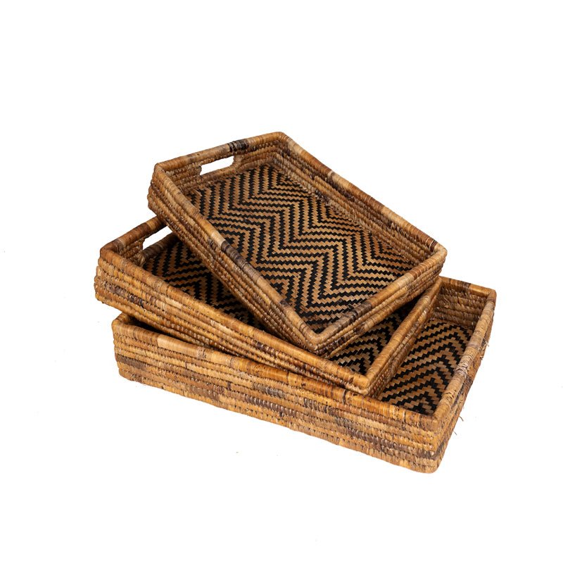 Banana Leaf Nesting Tray Set featuring natural woven trays with patterned interiors, perfect for home decor.