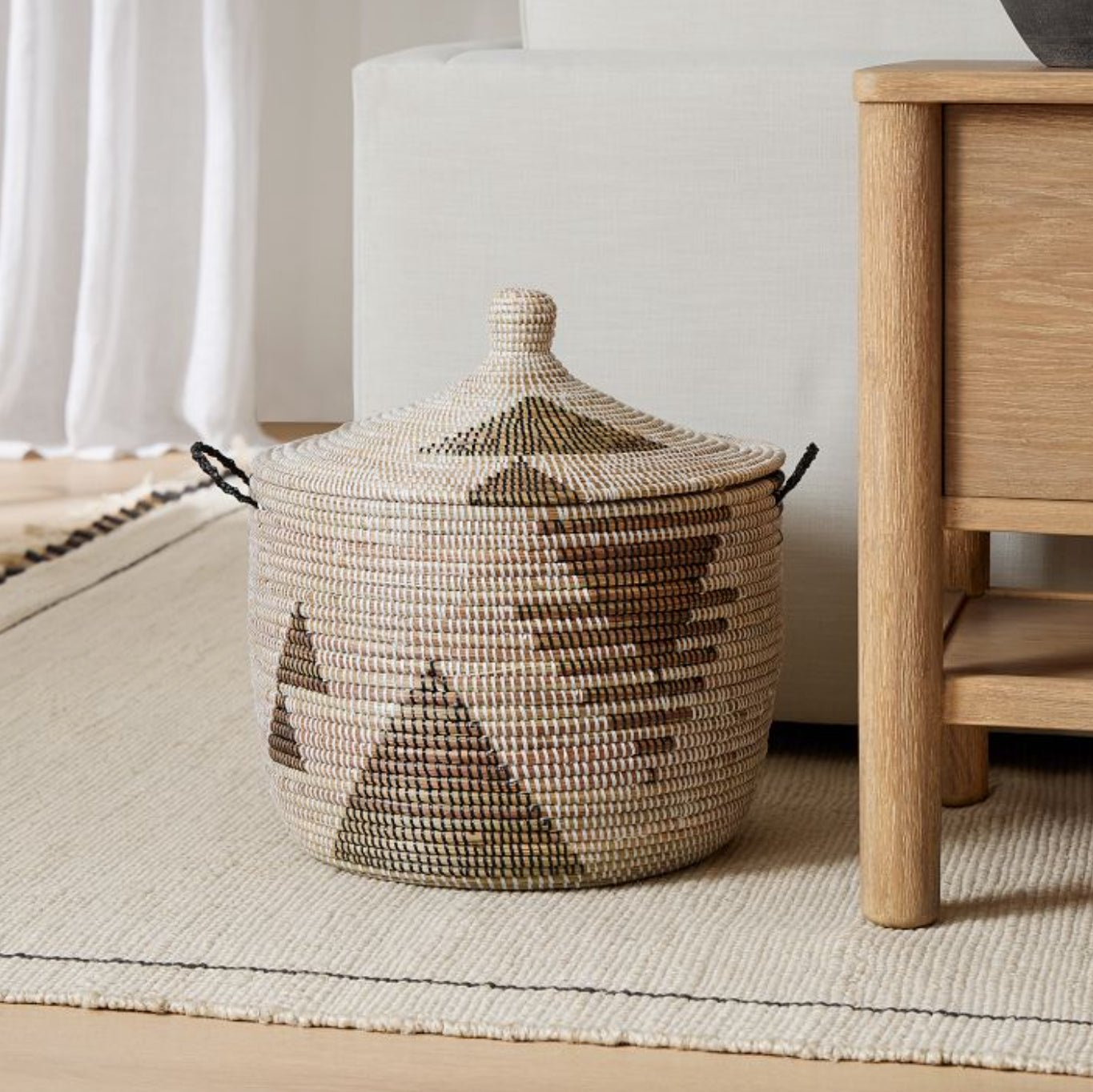 Large Graphic Print Storage Basket with Black and White, handmade, eco-friendly, woven from millet grass and recycled plastic.