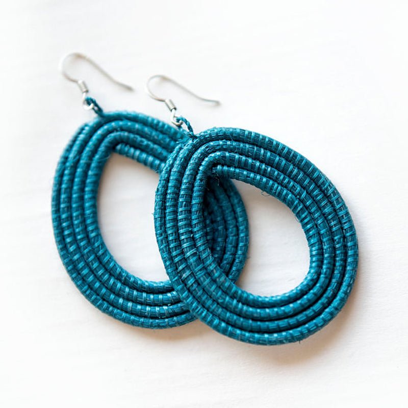 Hand-Woven Loop Earrings in vibrant teal, showcasing artisan craftsmanship and modern design for a stylish look.